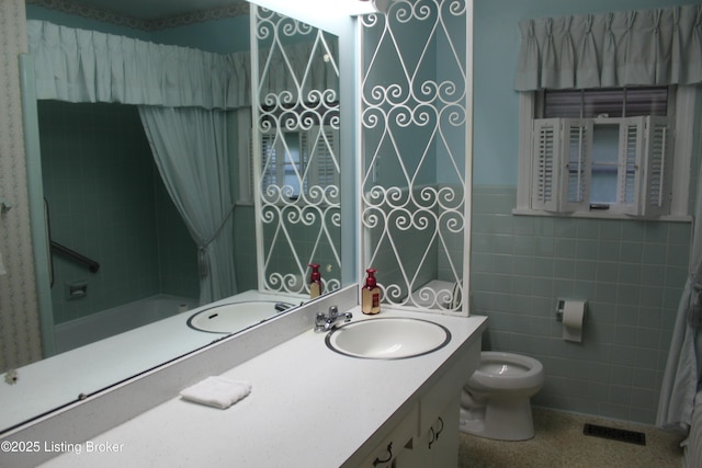 1600 Normandy Rd, Taylorsville, KY 40071 - full bath featuring tile walls, vanity, shower / bath combo, speckled floor, and wainscoting