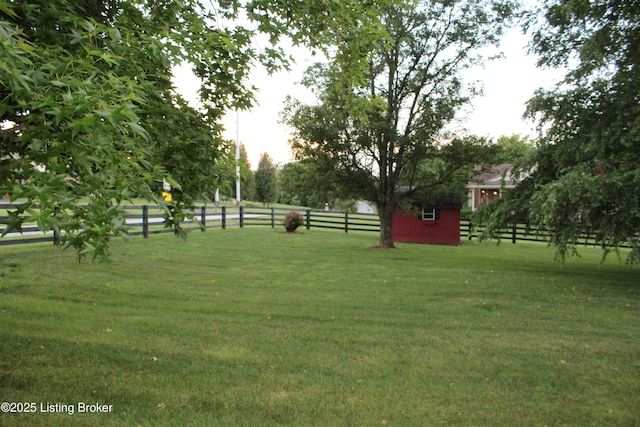 1600 Normandy Rd, Taylorsville, KY 40071 - fenced backyard with a storage unit