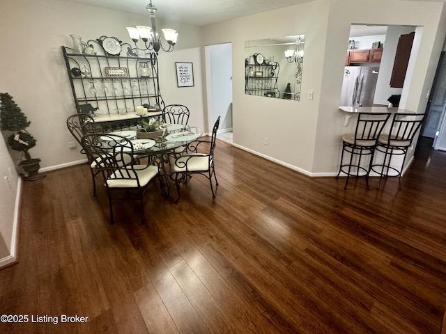 7520 Autumn Pointe Dr, Louisville, KY 40214 - dining space featuring a chandelier and dark wood finished floors
