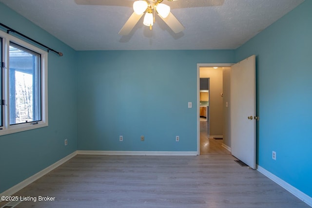 41 Raspberry Ct, Brandenburg, KY 40108 - unfurnished room featuring wood finished floors and ceiling fan