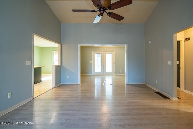 41 Raspberry Ct, Brandenburg, KY 40108 - spare room with a ceiling fan, wood finished floors, french doors, and lofted ceiling