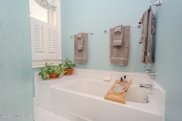 1211 Everett Ave, Louisville, KY 40204 - bathroom with a bath and tile patterned floors