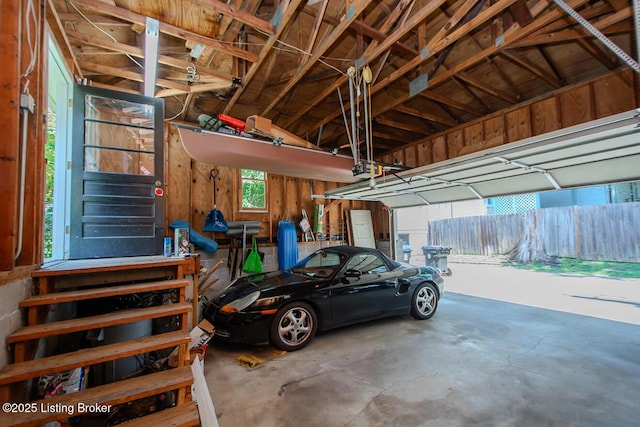 1211 Everett Ave, Louisville, KY 40204 - garage featuring a garage door opener