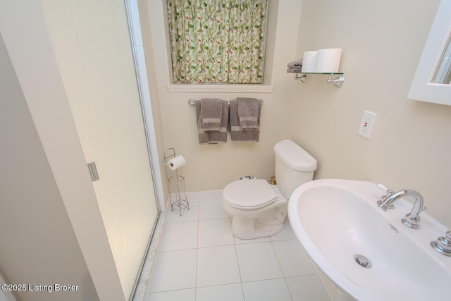 1211 Everett Ave, Louisville, KY 40204 - bathroom with a stall shower and tile patterned floors