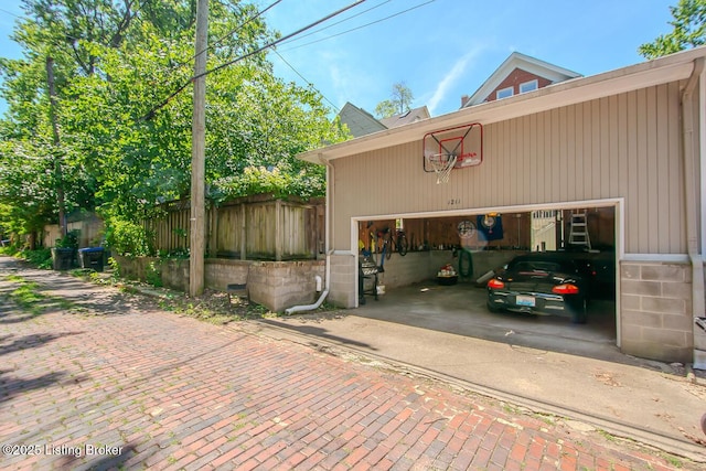 1211 Everett Ave, Louisville, KY 40204 - garage featuring decorative driveway