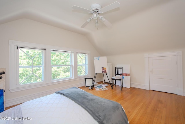 1211 Everett Ave, Louisville, KY 40204 - bedroom with lofted ceiling, multiple windows, light wood-style floors, and a ceiling fan