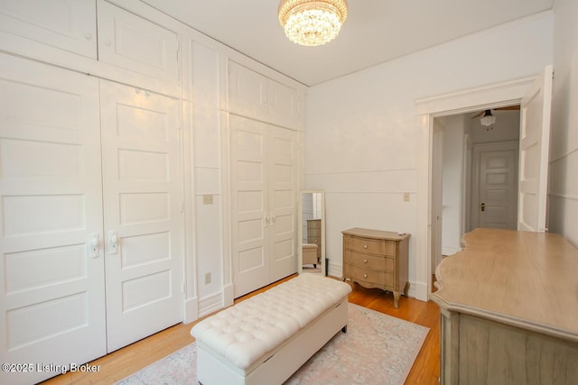1211 Everett Ave, Louisville, KY 40204 - bedroom with a chandelier, light wood-style flooring, and a closet