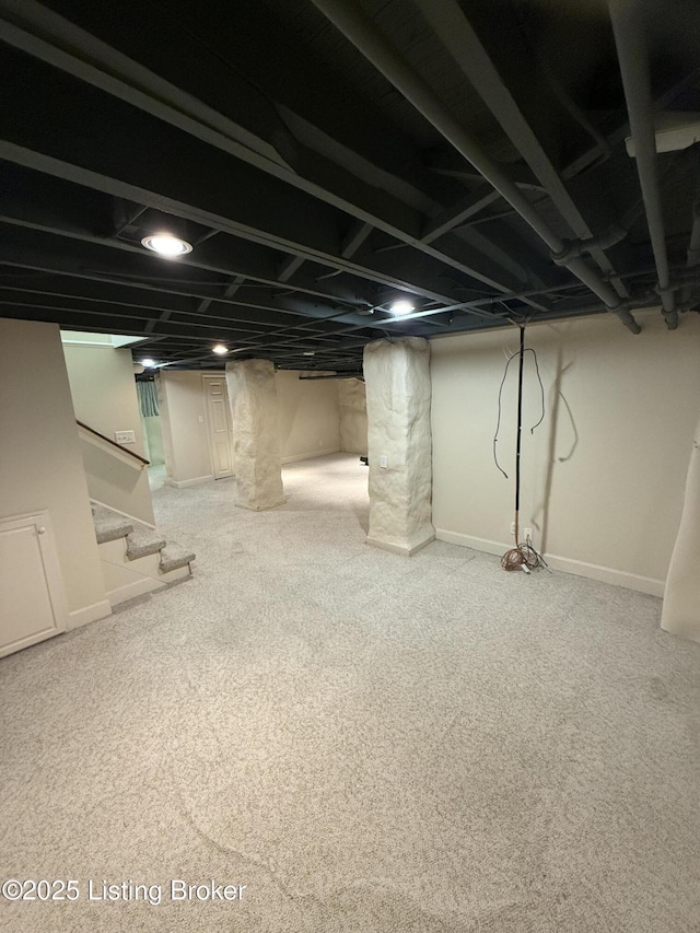 1211 Everett Ave, Louisville, KY 40204 - finished basement with stairway and carpet