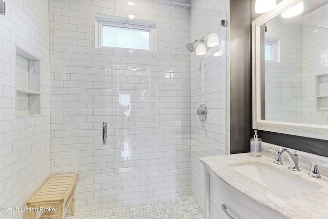 1700 Shady Ln, Louisville, KY 40205 - bathroom featuring a stall shower, vanity, and plenty of natural light
