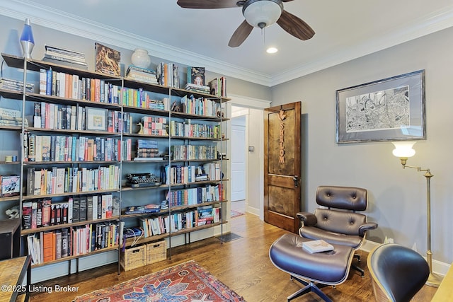 1700 Shady Ln, Louisville, KY 40205 - sitting room with wood finished floors, ceiling fan, ornamental molding, and recessed lighting