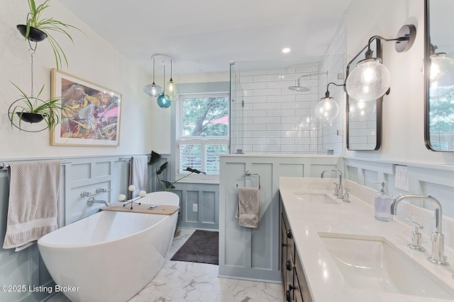 1700 Shady Ln, Louisville, KY 40205 - bathroom featuring a soaking tub, double vanity, and tiled shower