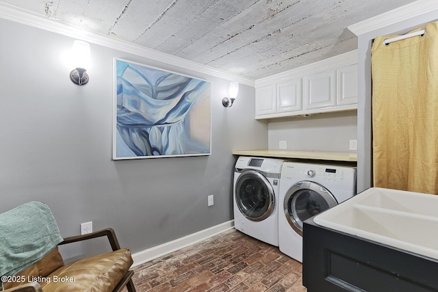 1700 Shady Ln, Louisville, KY 40205 - laundry room with washing machine and dryer, ornamental molding, cabinet space, and brick patterned flooring