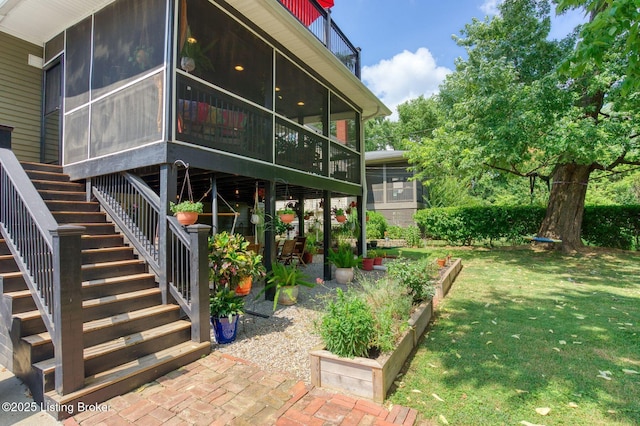 1700 Shady Ln, Louisville, KY 40205 - rear view of house featuring a sunroom, stairs, a yard, and a garden