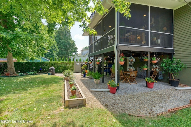 1700 Shady Ln, Louisville, KY 40205 - fenced backyard featuring a sunroom, a patio, and a garden