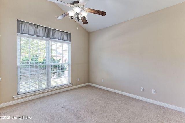 14518 Lake Village Dr Unit 4B, Louisville, KY 40299 - empty room with healthy amount of natural light, carpet flooring, vaulted ceiling, and a ceiling fan