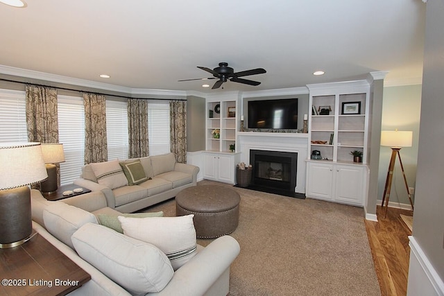 4201 Patterson Park Ct, Louisville, KY 40299 - living area with crown molding, ceiling fan, recessed lighting, a fireplace with flush hearth, and wood finished floors