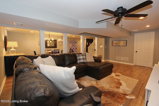 4201 Patterson Park Ct, Louisville, KY 40299 - living area featuring ornate columns, ceiling fan, wood finished floors, and recessed lighting
