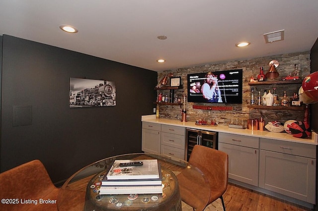 4201 Patterson Park Ct, Louisville, KY 40299 - indoor dry bar featuring wine cooler, light wood-style floors, and recessed lighting
