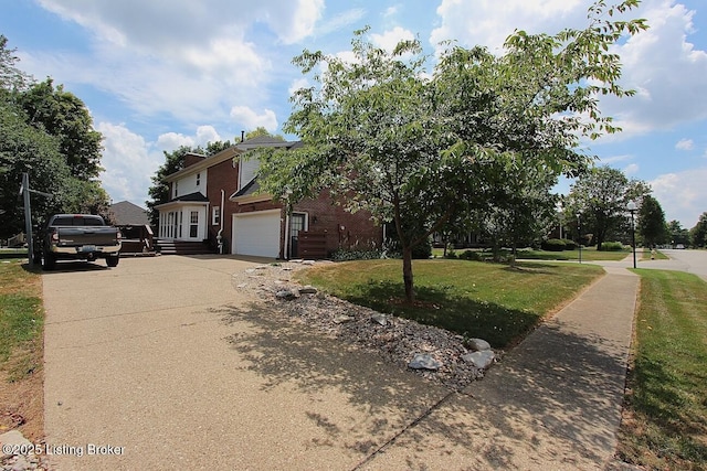 4201 Patterson Park Ct, Louisville, KY 40299 - view of front of home with driveway, a garage, a front lawn, and brick siding