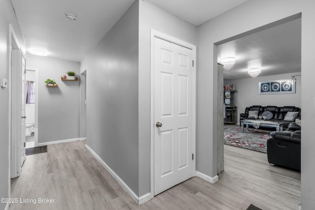 6206 Tabor Dr, Louisville, KY 40218 - corridor featuring light wood-style flooring