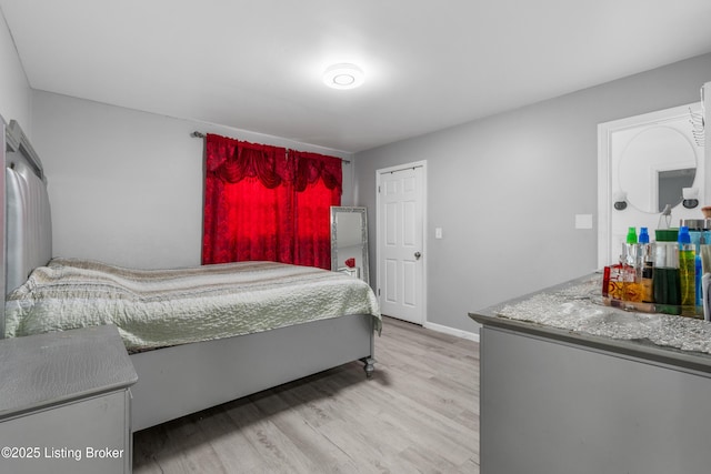 6206 Tabor Dr, Louisville, KY 40218 - bedroom featuring wood finished floors and baseboards