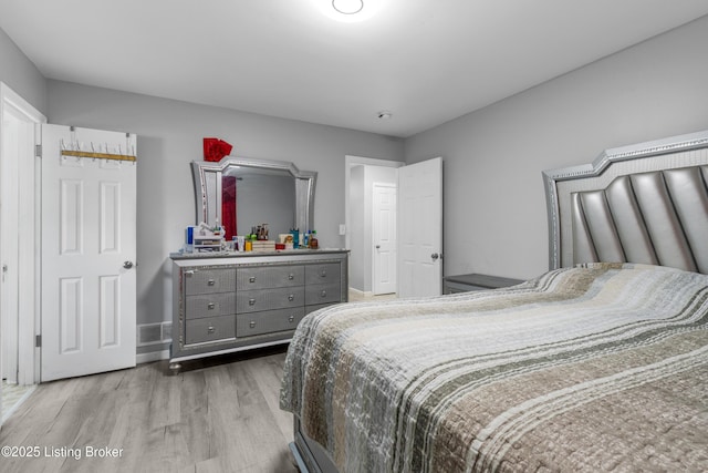 6206 Tabor Dr, Louisville, KY 40218 - bedroom with wood finished floors and baseboards