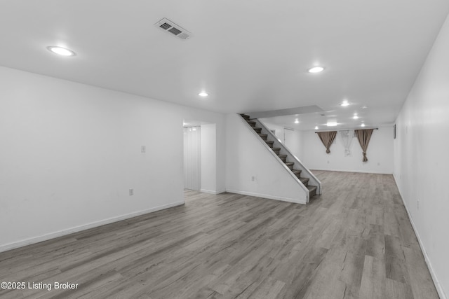 6206 Tabor Dr, Louisville, KY 40218 - finished basement featuring recessed lighting, stairway, and light wood-style floors