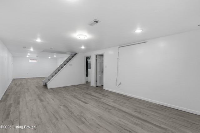 6206 Tabor Dr, Louisville, KY 40218 - finished below grade area featuring stairway, light wood-style flooring, and recessed lighting