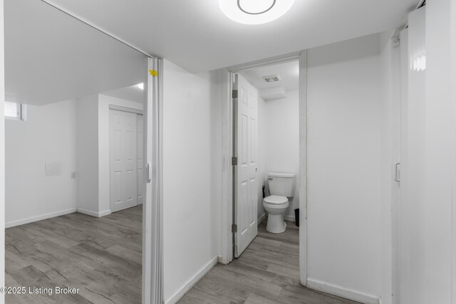 6206 Tabor Dr, Louisville, KY 40218 - bathroom with wood finished floors and toilet