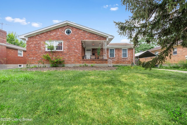 6206 Tabor Dr, Louisville, KY 40218 - back of property featuring brick siding, a lawn, and a porch