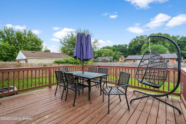 6206 Tabor Dr, Louisville, KY 40218 - wooden terrace featuring a fenced backyard and outdoor dining area