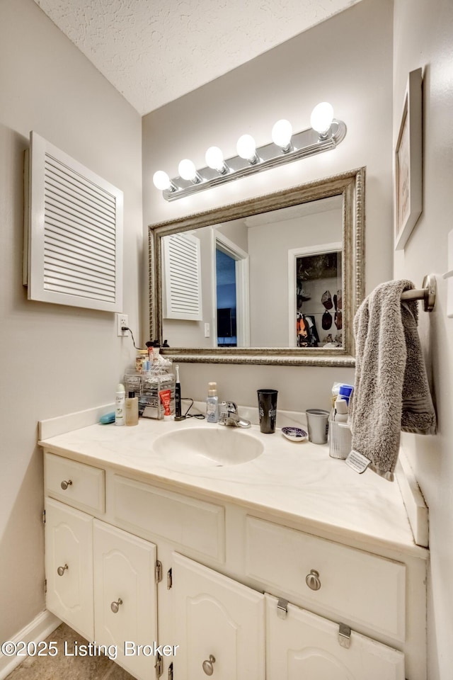 9315 Loch Lea Ln Unit B, Louisville, KY 40291 - bathroom with vanity, a textured ceiling, and tile patterned floors