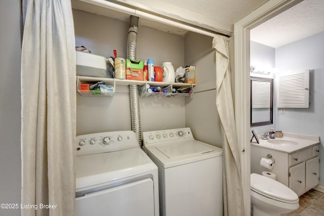 9315 Loch Lea Ln Unit B, Louisville, KY 40291 - laundry room with independent washer and dryer and a textured ceiling