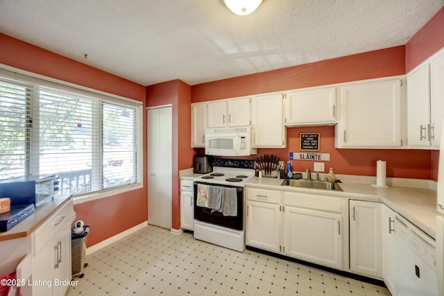 9315 Loch Lea Ln Unit B, Louisville, KY 40291 - kitchen with white appliances, white cabinetry, light flooring, and light countertops
