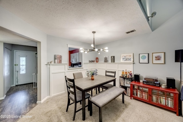 9315 Loch Lea Ln Unit B, Louisville, KY 40291 - carpeted dining area featuring a textured ceiling and a chandelier