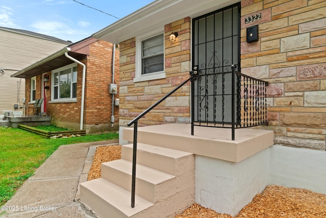 3322 Virginia Ave, Louisville, KY 40211 - view of exterior entry featuring stone siding