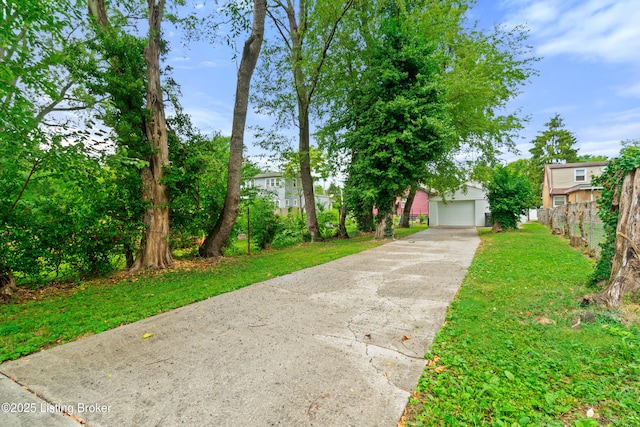 3322 Virginia Ave, Louisville, KY 40211 - view of front of home with concrete driveway and a garage