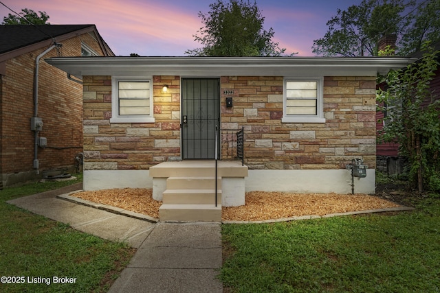 3322 Virginia Ave, Louisville, KY 40211 - view of front of house with stone siding and a chimney