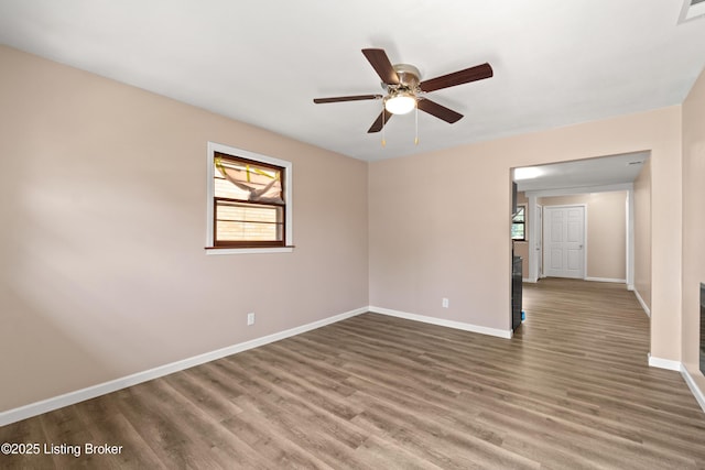 3322 Virginia Ave, Louisville, KY 40211 - spare room with wood finished floors and ceiling fan