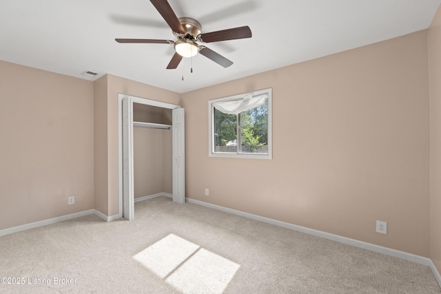 3322 Virginia Ave, Louisville, KY 40211 - unfurnished bedroom featuring light colored carpet, a closet, and a ceiling fan