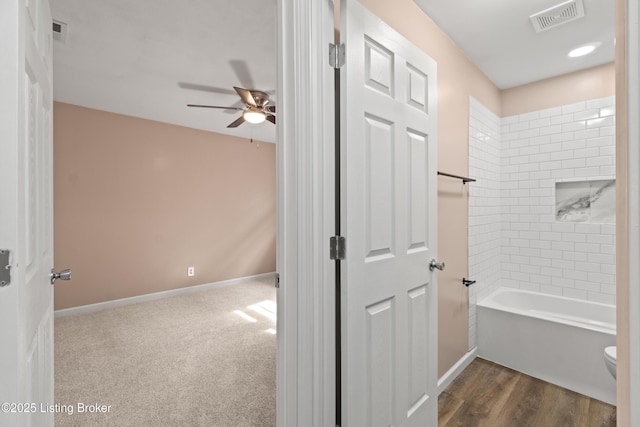 3322 Virginia Ave, Louisville, KY 40211 - bathroom featuring ceiling fan and shower / washtub combination