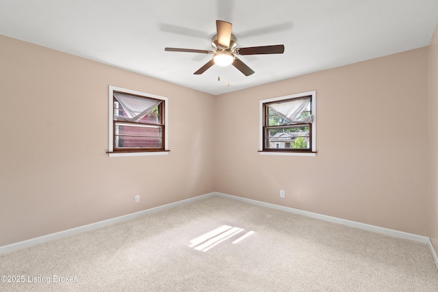 3322 Virginia Ave, Louisville, KY 40211 - carpeted spare room featuring baseboards and ceiling fan