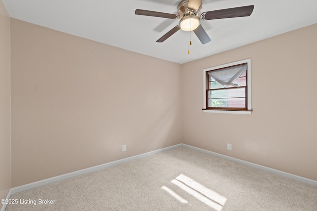3322 Virginia Ave, Louisville, KY 40211 - carpeted spare room with baseboards and a ceiling fan