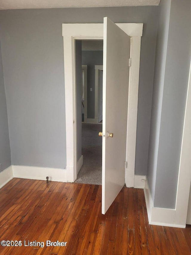 114 S Bayly Ave, Louisville, KY 40206 - corridor featuring wood-type flooring