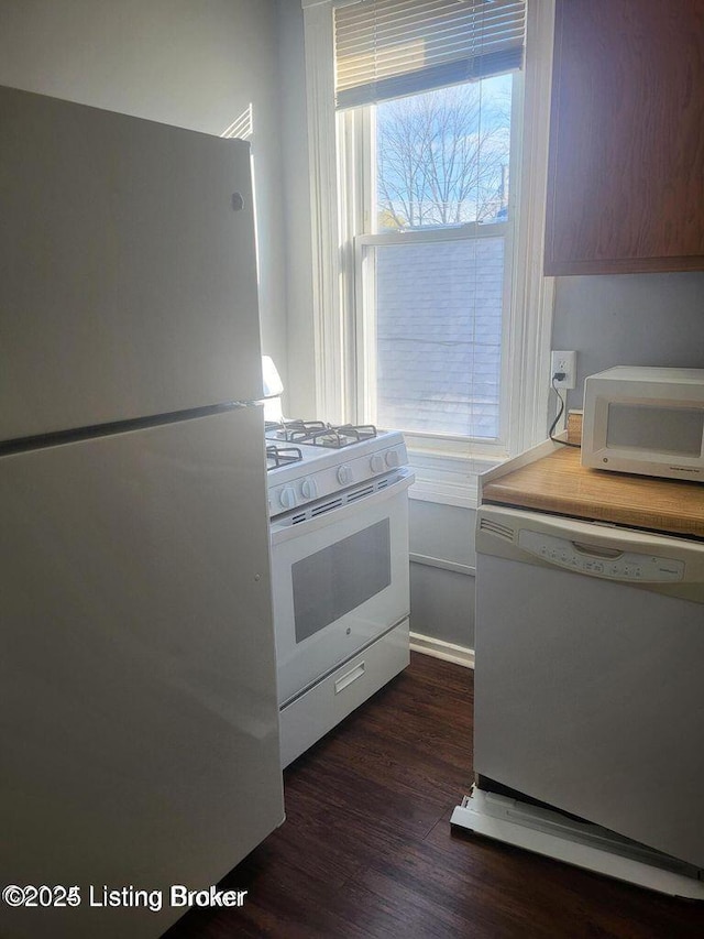 114 S Bayly Ave, Louisville, KY 40206 - kitchen with white appliances, dark wood-type flooring, and light countertops