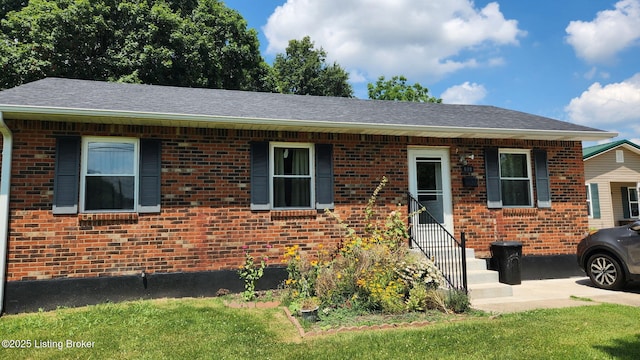 609 E Main St, Vine Grove, KY 40175 - single story home with brick siding, a front lawn, and a shingled roof