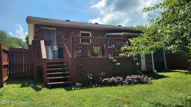 609 E Main St, Vine Grove, KY 40175 - back of property featuring brick siding and a deck