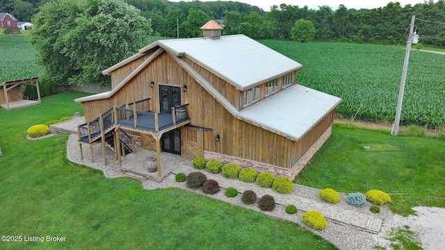 650 Midway Rd, Guston, KY 40142 - back of property with french doors, a lawn, a metal roof, a deck, and stone siding