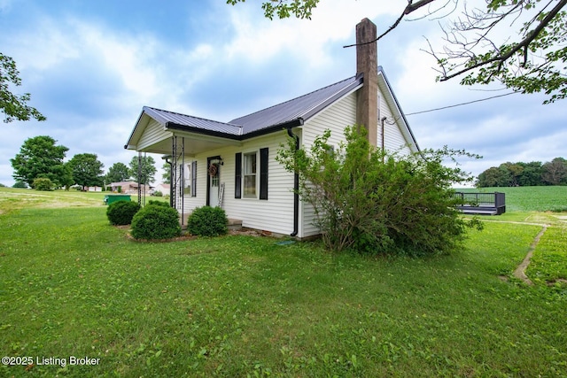 650 Midway Rd, Guston, KY 40142 - view of side of property with a yard, a metal roof, and a chimney