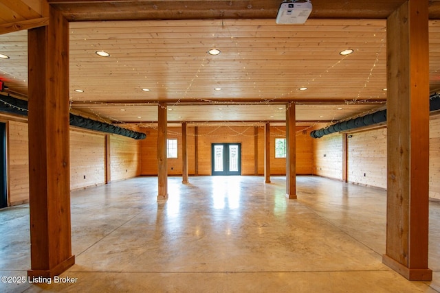 650 Midway Rd, Guston, KY 40142 - unfurnished living room featuring finished concrete flooring, wood ceiling, and recessed lighting